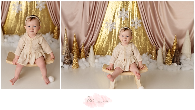 Calgary winter-themed cake smash baby sitting on stool