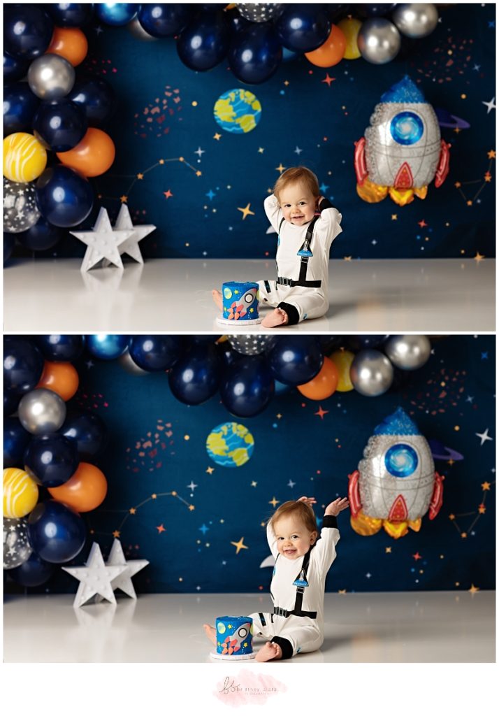 Calgary space themed cake smash astronaut boy hands in air