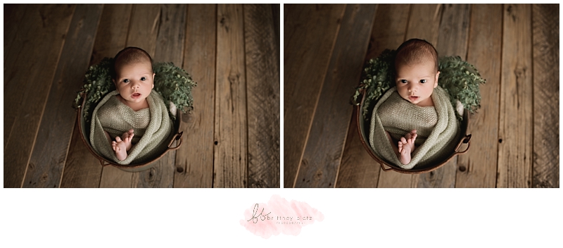 Calgary newborn photographer baby boy bucket wide gaze