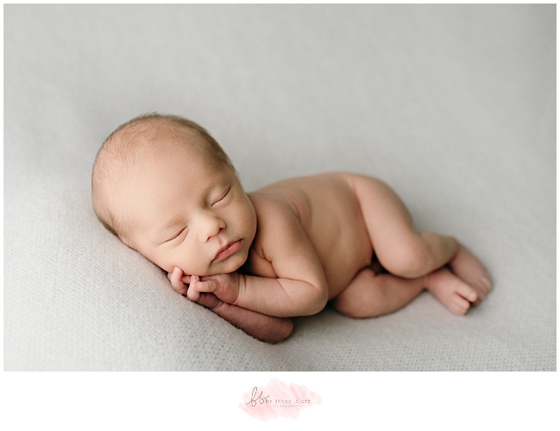 Calgary newborn photographer side laying