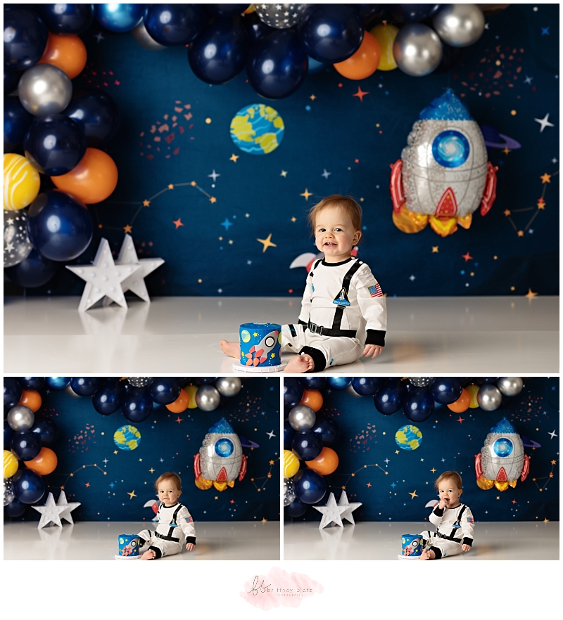 Calgary space themed cake smash astronaut boy smiling