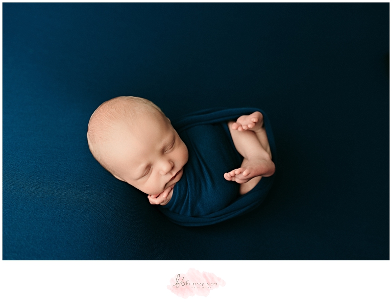 Calgary newborn baby boy wrapped in blue