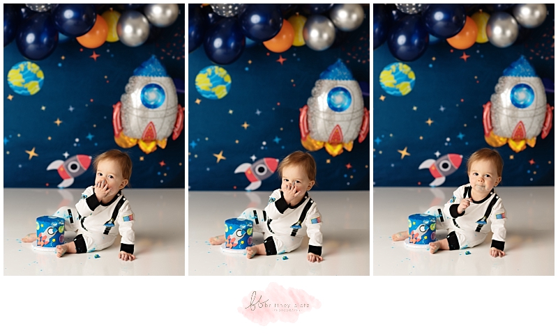 Calgary space themed cake smash astronaut boy eating cake