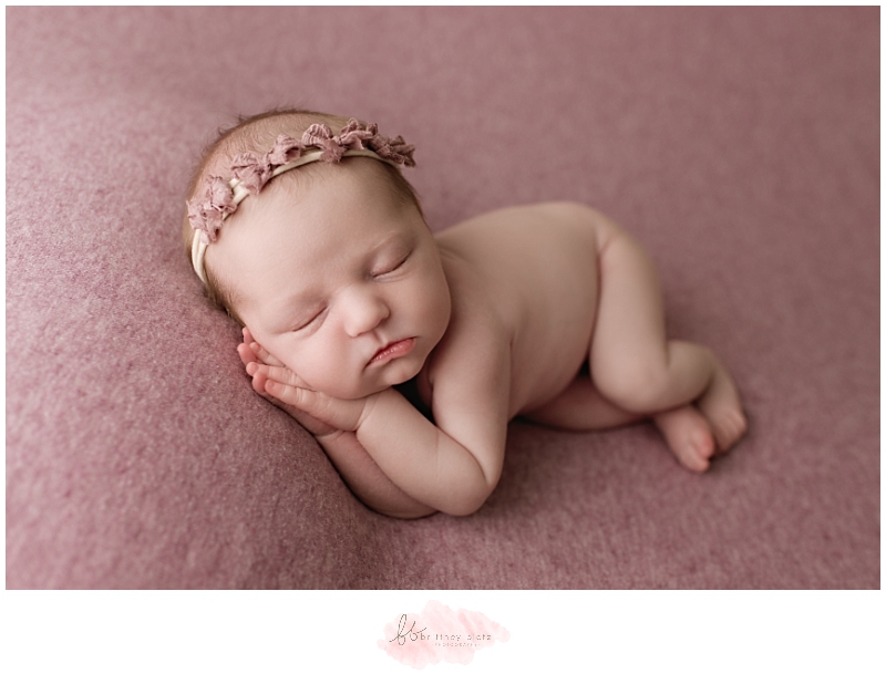 Calgary newborn photographer baby girl on purple